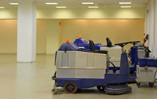 Riding Industrial Floor Scrubbers and Sweepers Cleaning Services